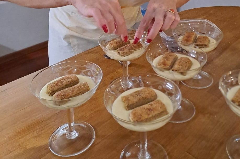 Tiramisù being layered in glasses at davVero