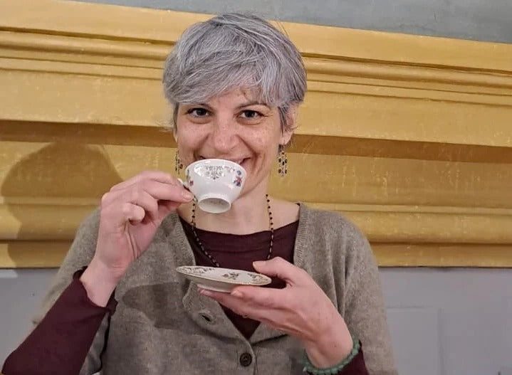 Veronica Menarini of davVero with a cup of coffee in her Bologna kitchen