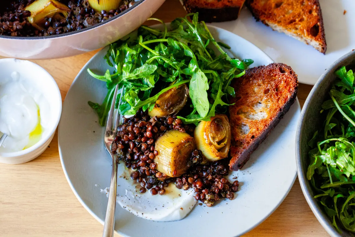 Braised leeks and lentils with arugula and yogurt from Smitten Kitchen